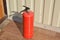 Handheld fire extinguisher to protect home and interior from fire