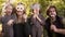 Handheld video shows of family in scary masks