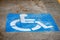 Handicap Parking sign painted on asphalt - Italy