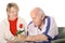 Handicap senior giving wife a rose