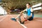 Handicapped Athlete Resting on Running Track