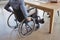 Handicapped executive sitting on wheelchair at desk