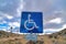 Handicapped parking and van accessible sign against Joshua Tree National Park