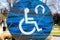 Handicapped sign weathered outdoors