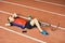 Handicapped Sportsman Resting on Running Track