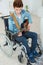 Handicapped teenager playing guitar