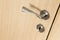 Handle and lock detail on a wooden door