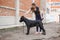 Handler with a dog Cane Corso Italian Mastiff