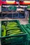 Handling and packaging of green cucumbers vegetables in Dutch greenhouse, agriculture in the Netherlands