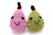 Handmade amigurumi crochet knit pink and green pears, isolated on white background