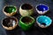 Handmade Assorted Many Different Bright Multicolored Ceramic Bowls and Cups Handcrafted / Assortment Variety on Dark Surface and