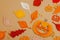 Handmade autumn background. Set of different fall knitted and crocheted fall leaves and wooden pumpkins