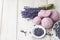 Handmade bath bombs and lavender on white planks
