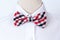 Handmade bow tie on white shirts background