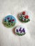 Handmade brooches embroidered with spring flowers