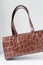 Handmade brown embossed calfskin leather handbag