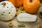 Handmade ceramic products in the shape of red and white pumpkins