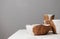 Handmade ceramic white with brown bowl and mugs on table with linen tablecloth. Kitchen minimalist rustic concept