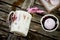 Handmade ceramics. Ice cubes, frozen berries, on wooden background.Freshness, rustic