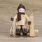 Handmade Christmas figure with a wooden background, made in the Erzgebirge, Germany