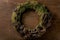 Handmade Christmas holidays wreath with moss and cones