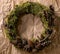 Handmade Christmas holidays wreath with moss and cones