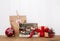 Handmade christmas presents wrapped in paper with red ribbon and