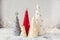 Handmade Christmas trees. Yarn wrapped cone trees and garland. XMAS gifts. DIY concept