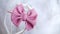 Handmade classic hair bow with dusty pink color as stylish headpiece