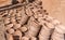 Handmade clay bowls stacked in columns, pottery workshop