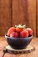 Handmade clay pot with strawberries of the Albion variety, with space for text