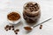 Handmade coffee-cocoa scrub on wooden background close up