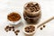 Handmade coffee-cocoa scrub on wooden background close up