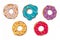 Handmade colorful paper cutout donuts for your design.