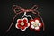 Handmade crocheted flowers with red and white string, known as Martisor.