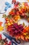handmade diy artifical autumn wreath decoration with leaves berry flower