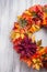 handmade diy artifical autumn wreath decoration with leaves berry flower