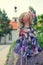 Handmade doll with natural hair in a long patchwork dress