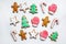 Handmade festive gingerbread cookies in the form of stars, snowflakes, people, socks, staff, mittens, Christmas trees, hearts for