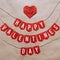 Handmade folded origami heart, Happy Valentines Day red paper garland lettering message. Nice square Holiday postcard, greeting