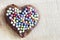 Handmade gingerbread heart decorated with sugar pearls