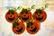 Handmade Halloween pumpkins on a window. Sponge pumpkins.