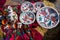 Handmade and hand painted shallow soup ceramic clay plates jug and cups with traditional Podillia abstract and bird patterns