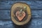 Handmade heart shape on wood slice