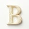 Handmade Ivory Letter B With Twisted Details And Floral Pattern