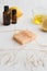Handmade lemon soap, lemons and olive oil vertical image