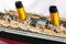 Handmade model of Titanic. Beautiful Handmade model of Titanic isolated on  background