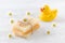 Handmade natural baby soap with chamomile flowers and a duck toy