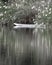 A handmade old boat banked on the shore of the Kavango River, Namibia