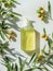 Handmade olive oil lotion, bottle of oil on light background among olives, branch of an olive tree